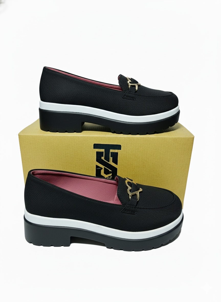 Chunky Sole Loafers: Black Elegance with Modern Hardware.